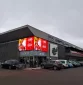 Kampinis LED lauko ekranas ant IKI VILNIUS parduotuvės fasado